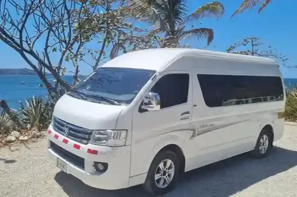 Our passenger van for ground transport, parked by the sea in Guanacaste