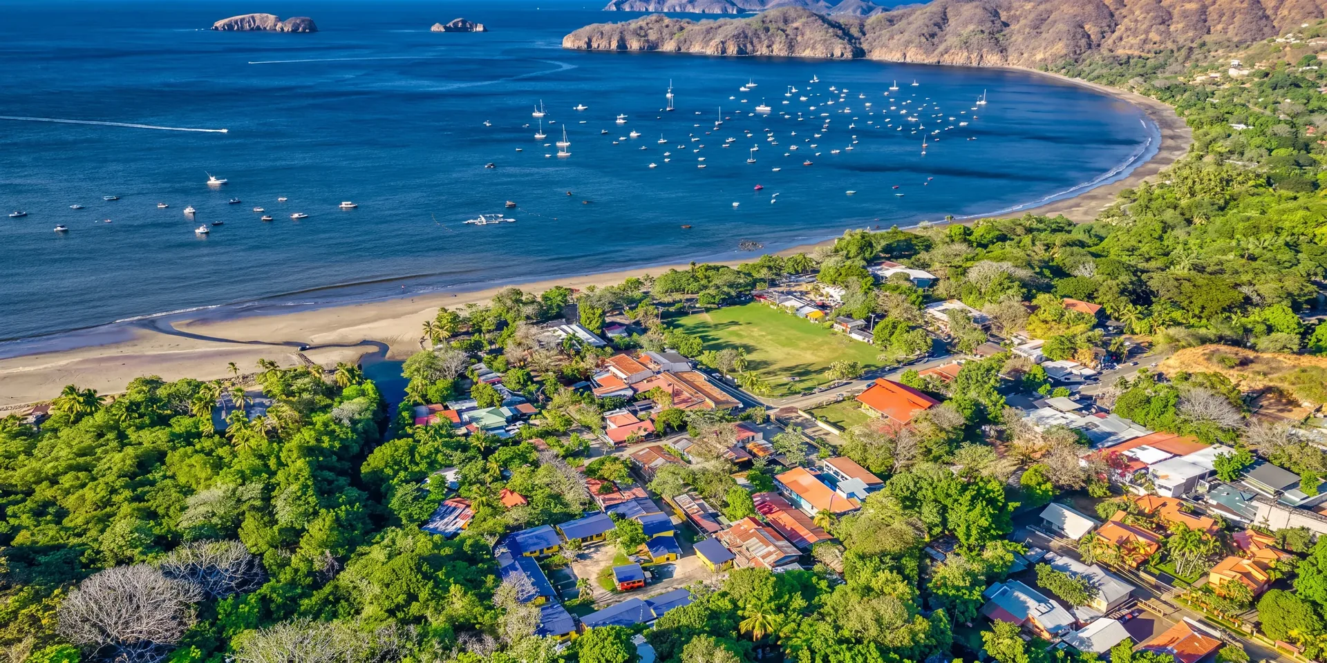Aerial view of Playas del Coco bay, with the sport fishing and sailing fleet at anchor